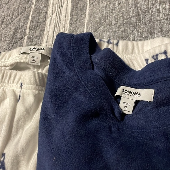 Women’s XL pajama set with penguins on the pants and a solid navy blue shirt. - Picture 2 of 4